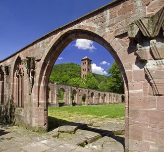 Gothic ogival arch ruins and the Owl Tower at Hirsau Monastery